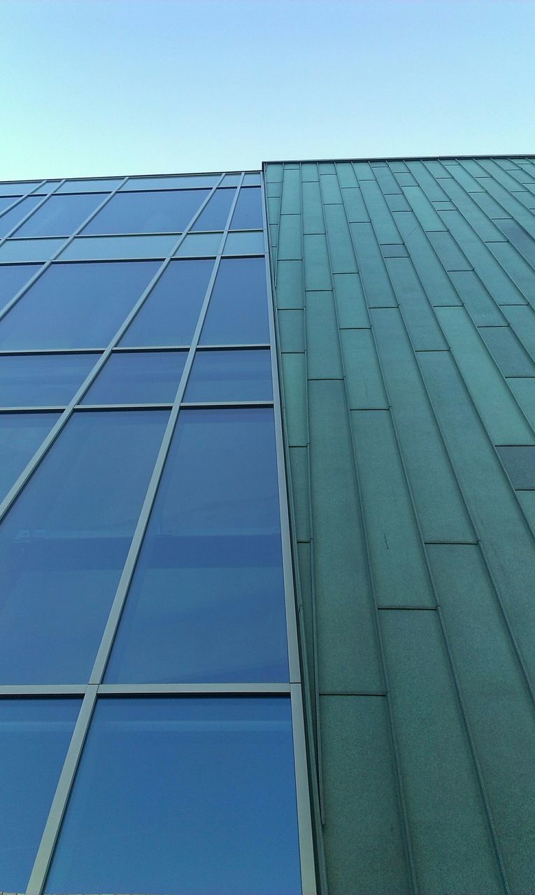 architecture, built structure, building exterior, low angle view, modern, office building, clear sky, glass - material, blue, skyscraper, city, reflection, tall - high, building, tower, day, window, sky, glass, no people