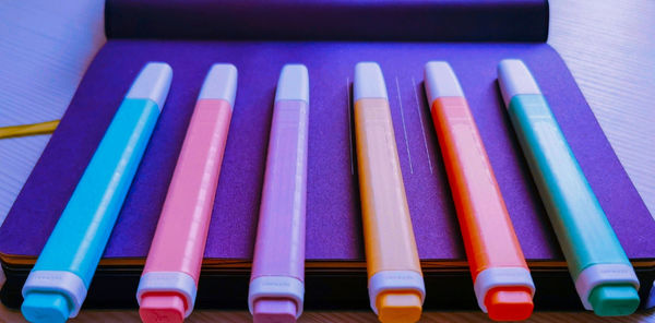 High angle view of multi colored pencils on table