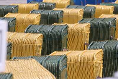 Full frame shot of hooded beach chairs