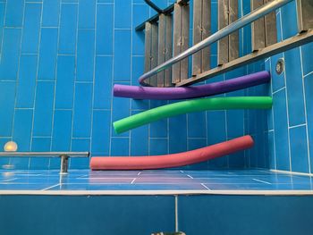 Ladder leading into the water of a pool