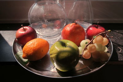 Close-up of fruits in glass on table