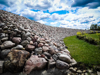 Rocks on land against sky