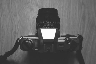 Close-up of camera on white background