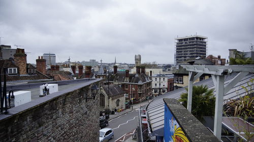 High angle view of street amidst buildings in city