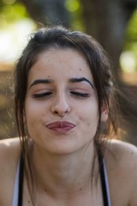 Close-up portrait of young woman