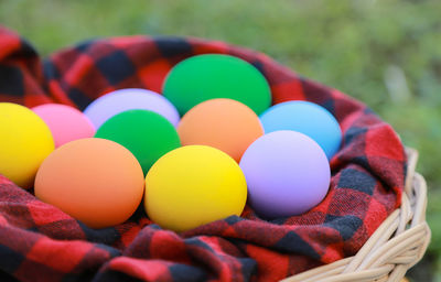 Close-up of multi colored balls in basket