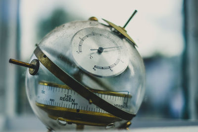 Close-up of clock on metal