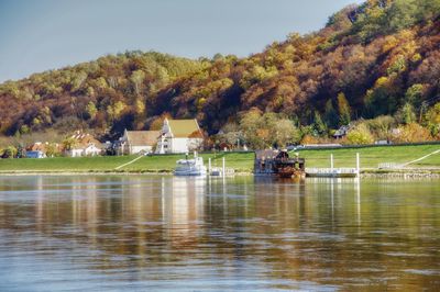 Scenic view of lake against sky during autumn