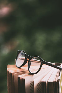 Close-up of eyeglasses on book