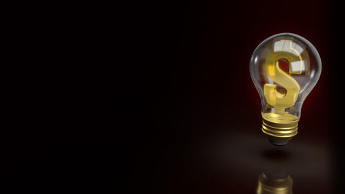 Close-up of illuminated light bulb