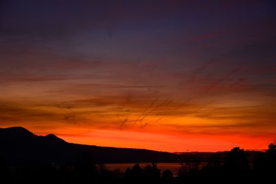 Silhouette of landscape against dramatic sky