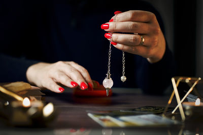 Midsection of man playing chess