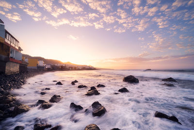 Scenic view of sea against sky during sunset