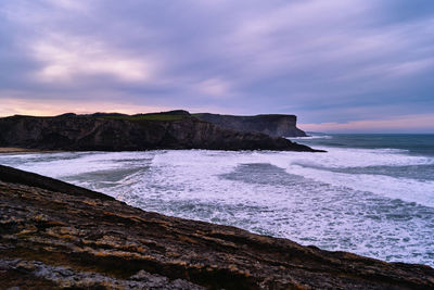 Scenic view of sea against sky during sunset