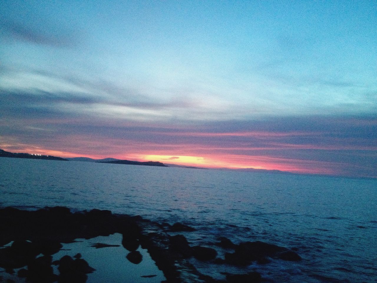 sunset, sky, nature, beauty in nature, reflection, scenics, water, no people, outdoors, sea, tranquility, tranquil scene, beach, horizon over water, cloud - sky, day