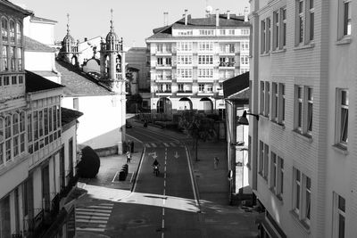 High angle view of street amidst buildings in city