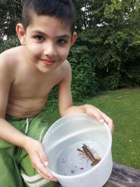 Portrait of boy in backyard