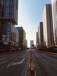 Buildings in city against sky
