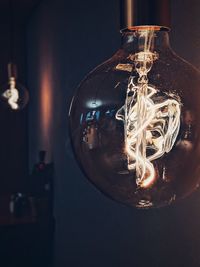 Close-up of illuminated light bulb