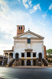 Facade of historic building against sky