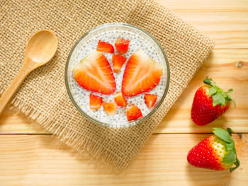 High angle view of strawberries on table