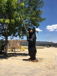 Full length of horse on sand against sky