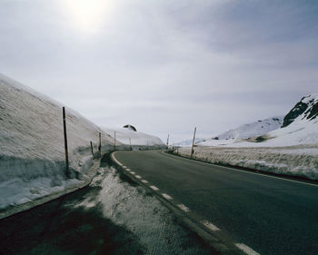 Road against sky during winter