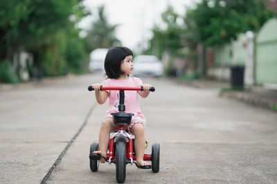 Cute girl riding cycle