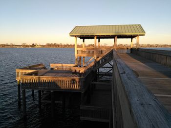 Lifeguard hut on beach against clear sky