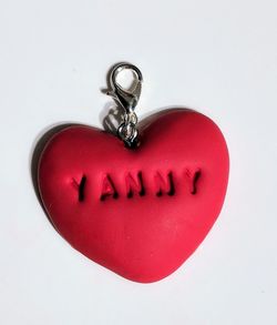 Close-up of heart shape with text on white background