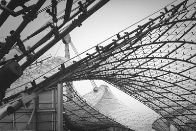 Low angle view of metallic structure against sky