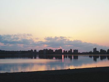 Scenic view of lake against sky during sunset