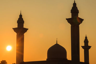 View of bell tower against sky during sunset