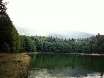Scenic view of lake with mountains in background