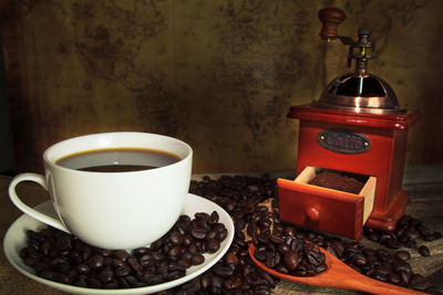 Close-up of coffee cup on table