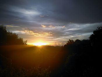 Scenic view of silhouette landscape against sky during sunset