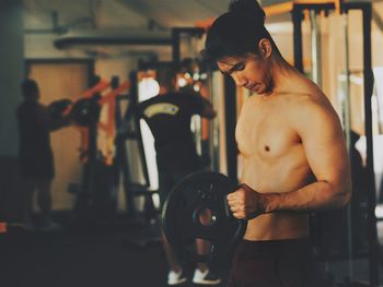 Man exercising with gym equipment