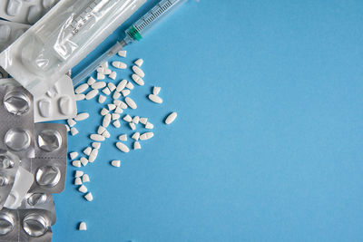 High angle view of blue metal on white background