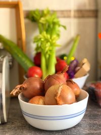 Close-up of fruits in bowl on table