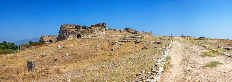 Old ruins against blue sky