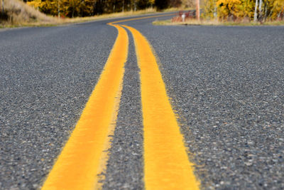 Surface level of double yellow lines on road