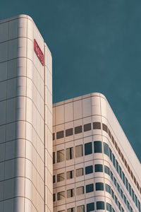 Low angle view of building against blue sky