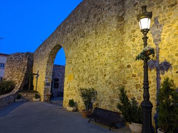 Archway of old building against sky