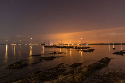 View of harbor at night
