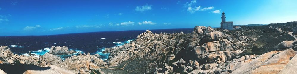 Scenic view of sea against blue sky
