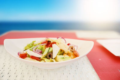 Close-up of fruit salad in plate on table