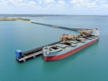 High angle view of ship moored on sea against sky