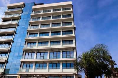 Low angle view of modern building against sky