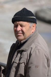 Close-up of man wearing hat