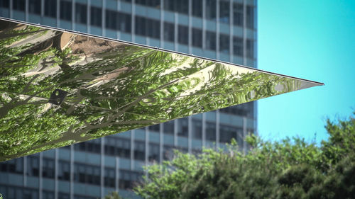 Low angle view of modern building against sky